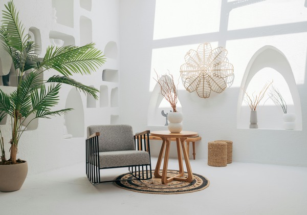 Quirky Illumination: Enhancing Small Unusual Accent Tables with Candle Lantern Wall Sconces